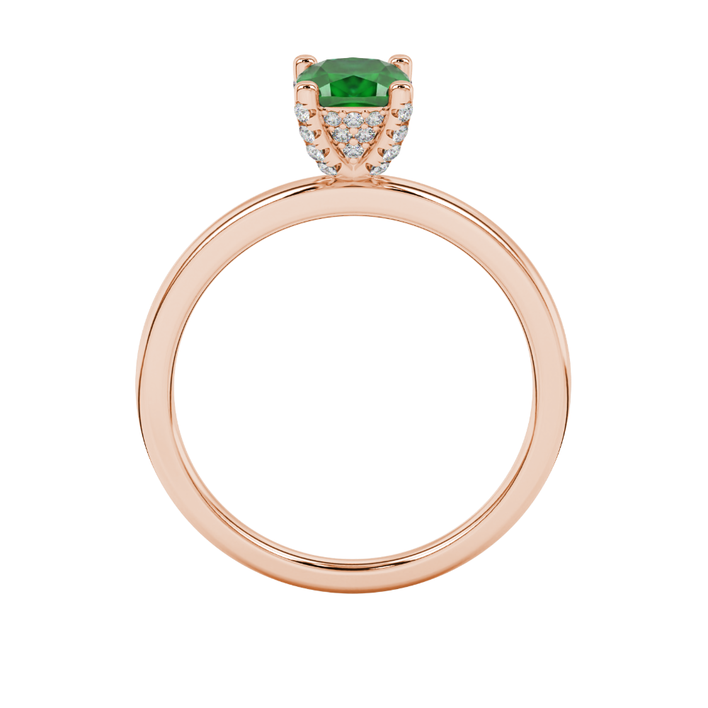 Green cushion cut gemstone ring with diamond gallery detailing in yellow gold