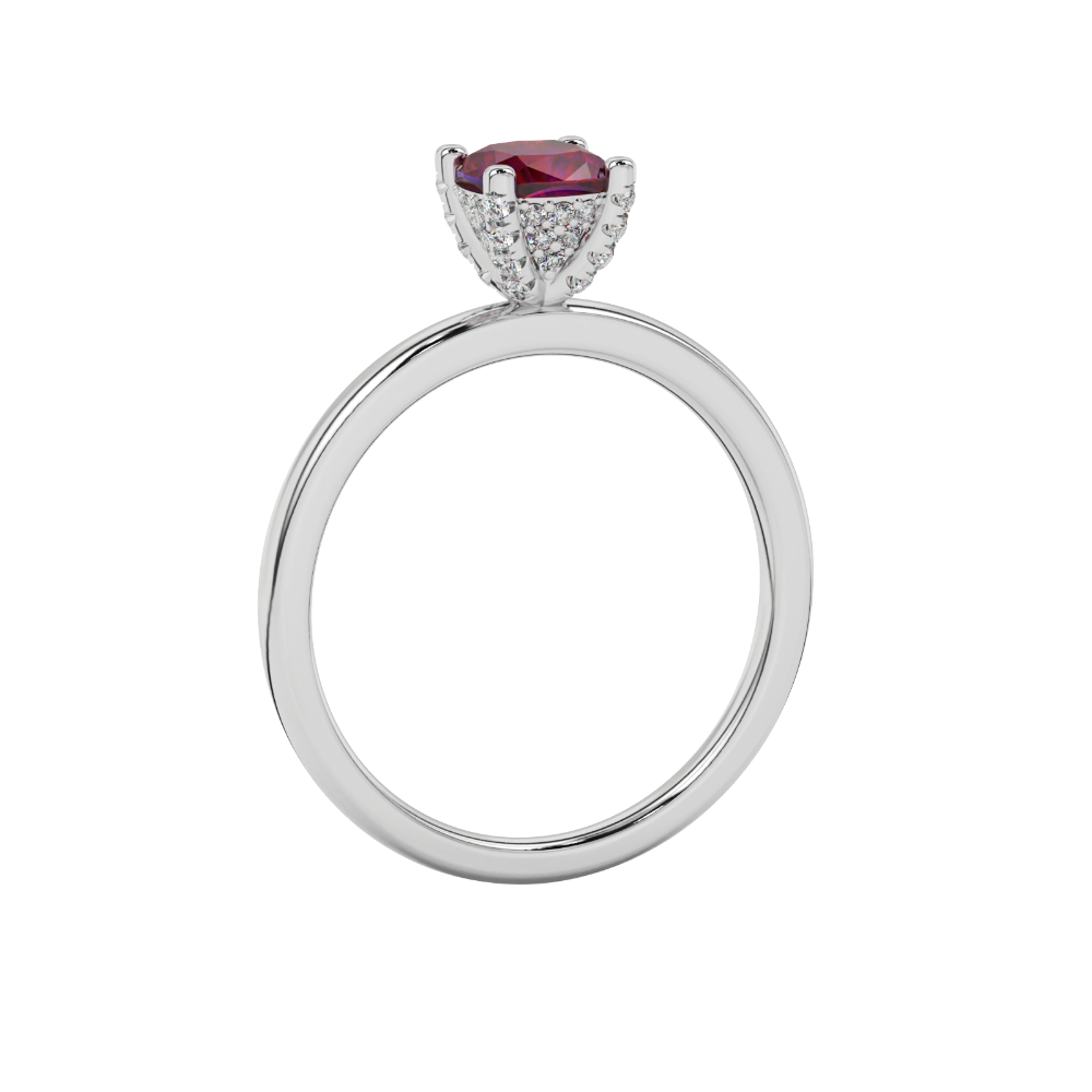 Red cushion cut gemstone ring with diamond gallery detailing in white gold