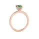 Green cushion cut gemstone ring with diamond gallery detailing in yellow gold
