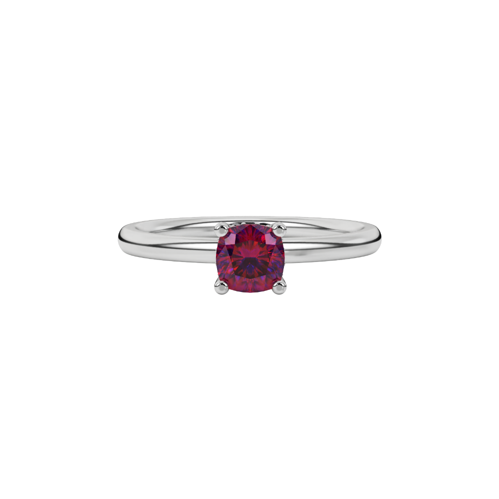 Red cushion cut gemstone ring with diamond gallery detailing in white gold