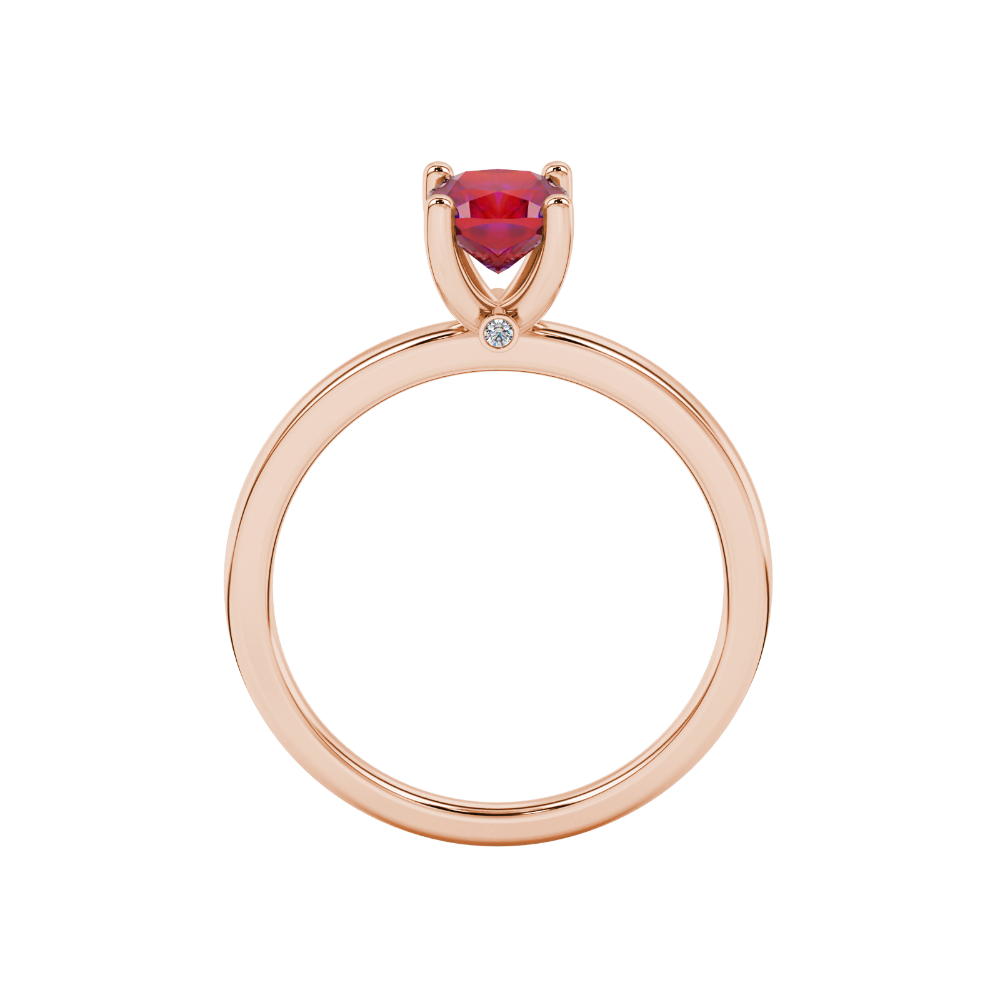 Red cushion cut solitaire gemstone ring with accent diamonds in rose gold four prong setting
