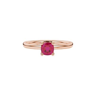 Red cushion cut solitaire gemstone ring with accent diamonds in rose gold four prong setting