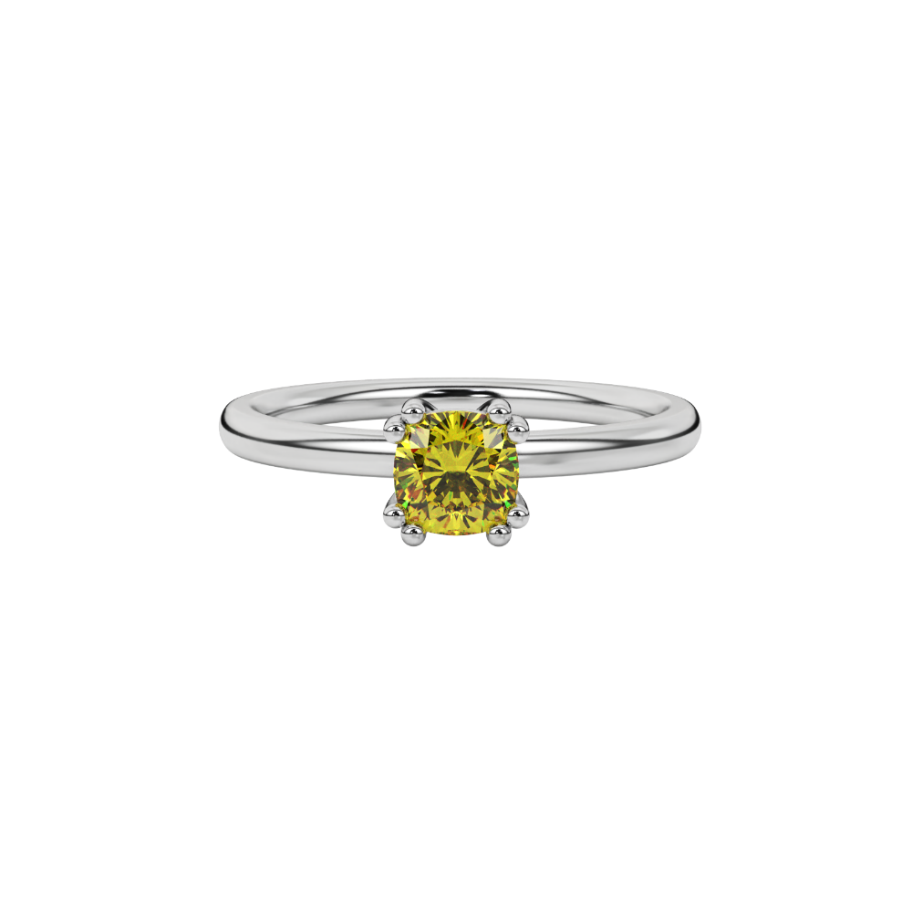 Yellow cushion cut solitaire gemstone ring in six-prong gold setting with slim stackable band