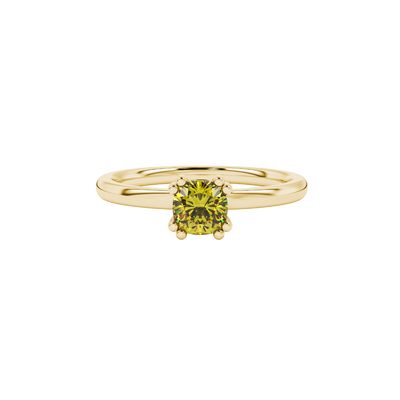 Yellow cushion cut solitaire gemstone ring in six-prong gold setting with slim stackable band