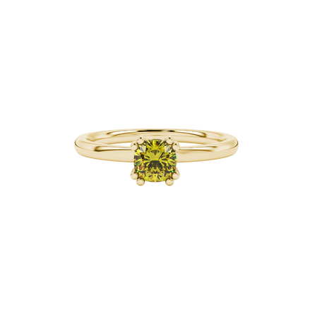 Yellow cushion cut solitaire gemstone ring in six-prong gold setting with slim stackable band