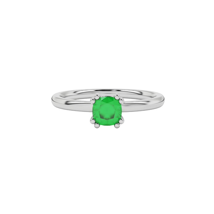 Green cushion cut solitaire gemstone ring in six-prong gold setting with slim stackable band