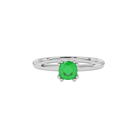 Green cushion cut solitaire gemstone ring in six-prong gold setting with slim stackable band