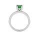 Green cushion cut solitaire gemstone ring in six-prong gold setting with slim stackable band