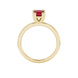 Red cushion cut solitaire gemstone ring in six-prong gold setting with slim stackable band