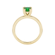 Green cushion cut solitaire gemstone ring in six-prong gold setting with slim stackable band