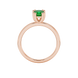 Green cushion cut solitaire gemstone ring in six-prong gold setting with slim stackable band