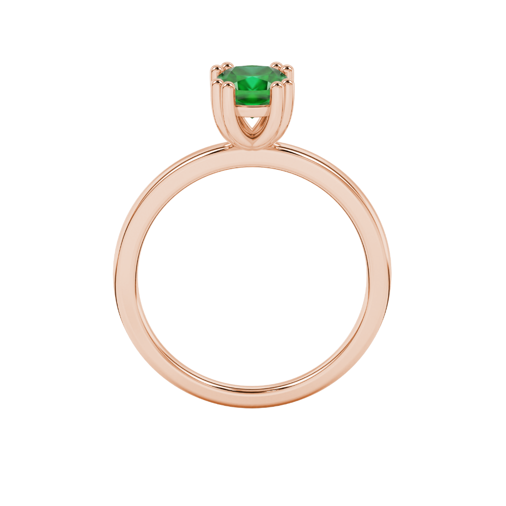 Green cushion cut solitaire gemstone ring in six-prong gold setting with slim stackable band