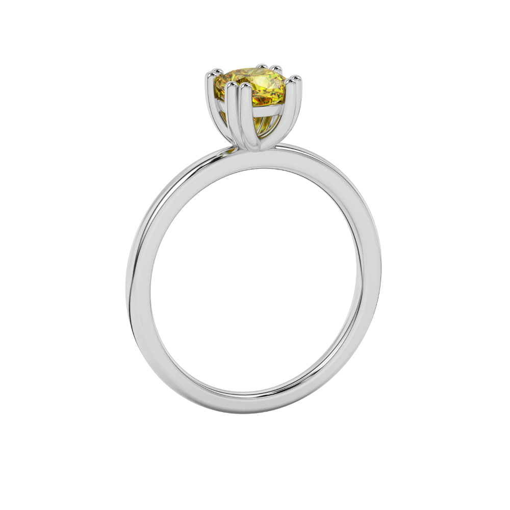 Yellow cushion cut solitaire gemstone ring in six-prong gold setting with slim stackable band
