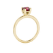 Red cushion cut solitaire gemstone ring in six-prong gold setting with slim stackable band
