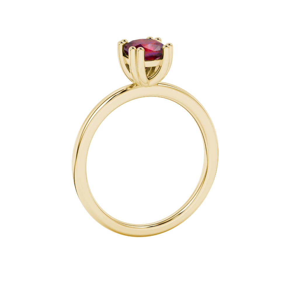 Red cushion cut solitaire gemstone ring in six-prong gold setting with slim stackable band