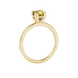 Yellow cushion cut solitaire gemstone ring in six-prong gold setting with slim stackable band