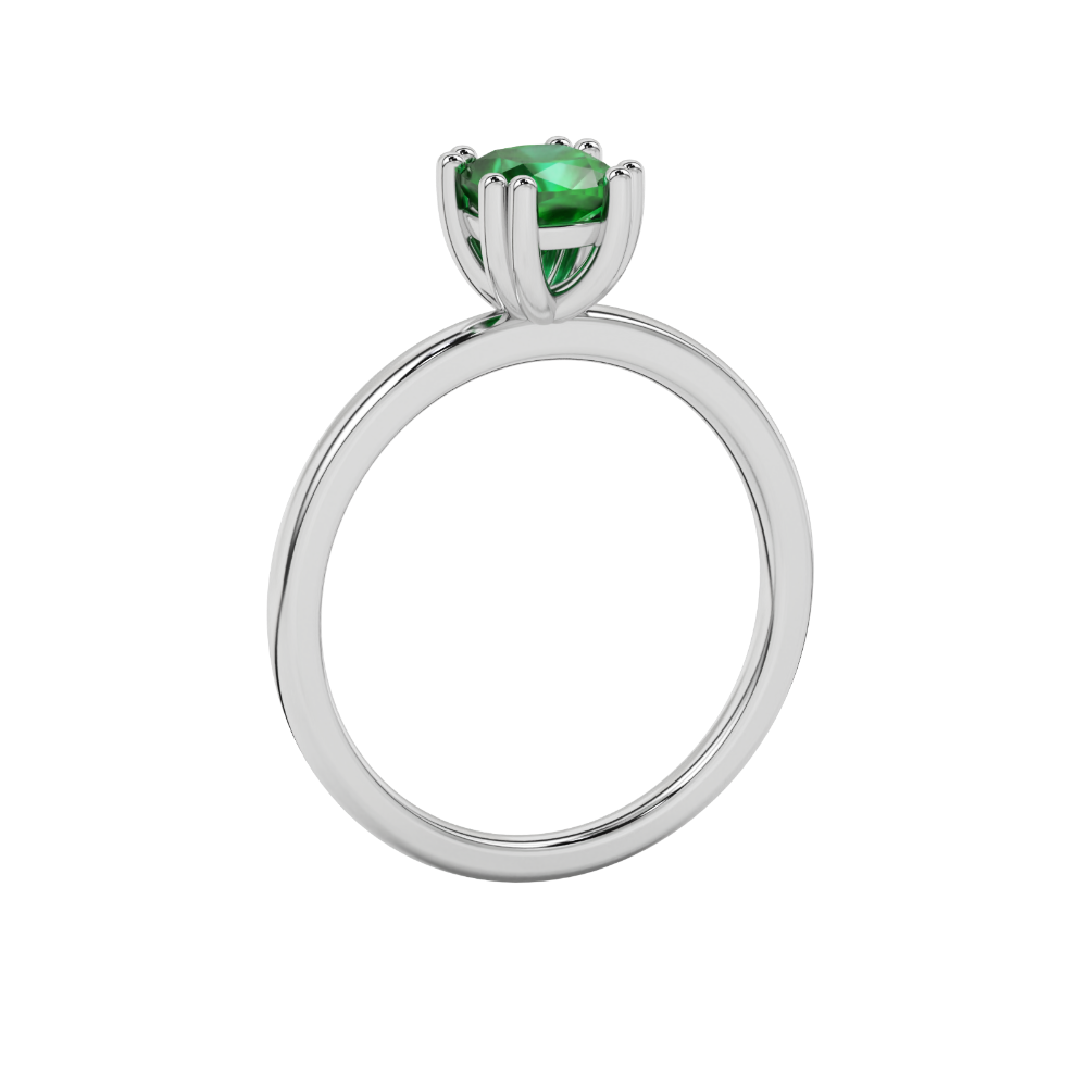 Green cushion cut solitaire gemstone ring in six-prong gold setting with slim stackable band