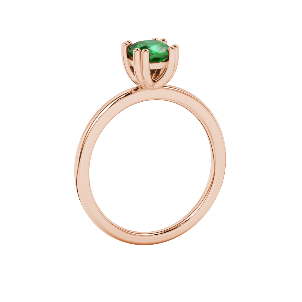 Green cushion cut solitaire gemstone ring in six-prong gold setting with slim stackable band