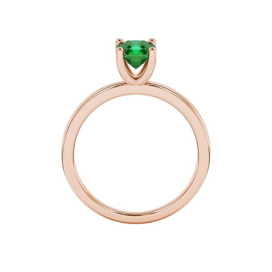 Radiant-cut emerald green gemstone solitaire ring in a rose gold four-prong setting