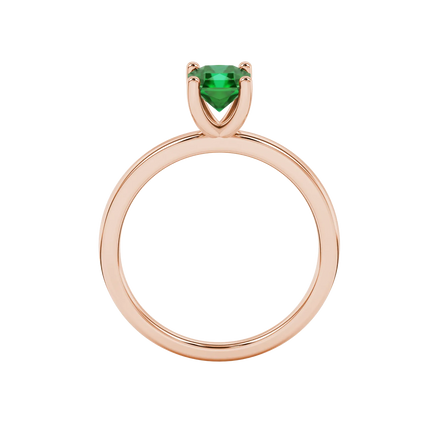 Radiant-cut emerald green gemstone solitaire ring in a rose gold four-prong setting