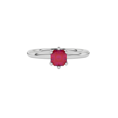 close-up of a radiant raspberry red gemstone enclosed in a white gold six-prong ring setting.