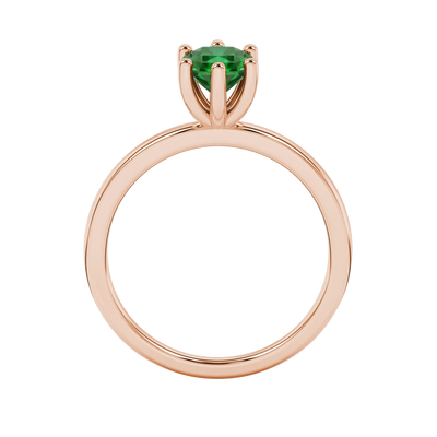 Radiant-cut emerald green gemstone solitaire ring in a rose gold six-prong setting.