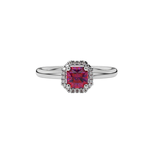close-up of a radiant raspberry red gemstone enclosed in a white gold french pavé halo ring setting.