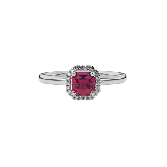 close-up of a radiant raspberry red gemstone enclosed in a white gold french pavé halo ring setting.
