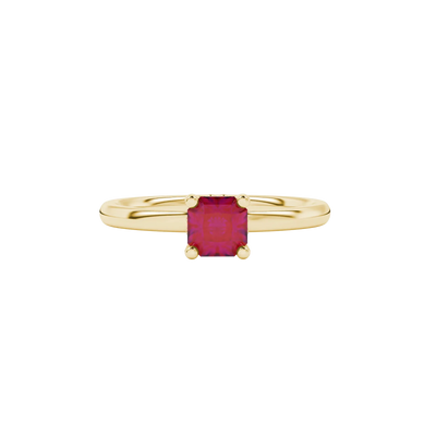 Close-up details of a radiant-cut raspberry red gemstone in a yellow gold lotus basket ring.