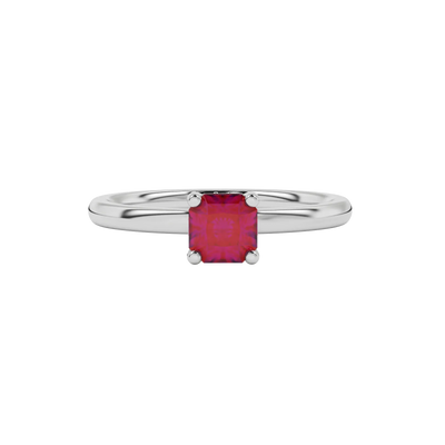 close-up of a radiant raspberry red gemstone enclosed in a white gold pavé basket ring setting.