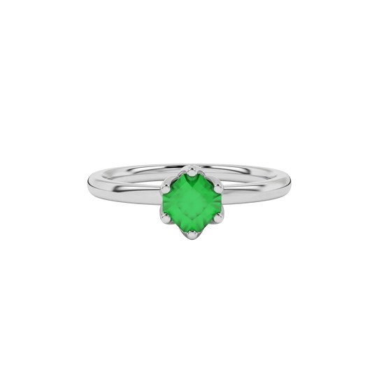 Close-up details of a radiant emerald green gemstone secured in a white gold scalloped six-prong ring.