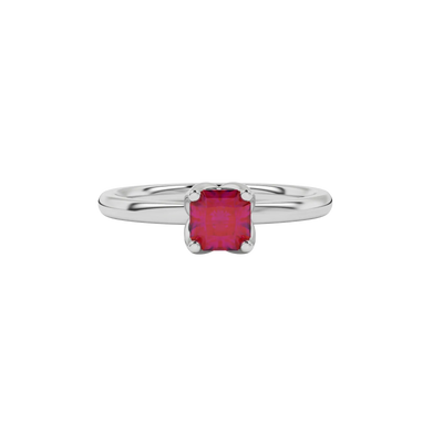 close-up of a radiant raspberry red gemstone enclosed in a white gold tulip basket ring setting.