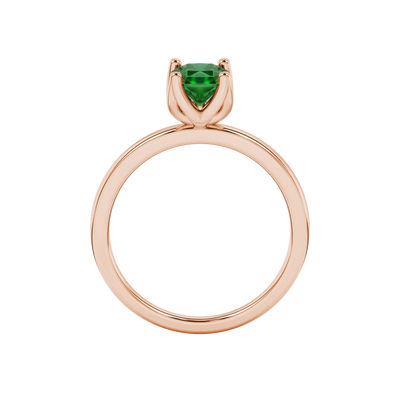 Radiant-cut emerald green gemstone solitaire ring in a rose gold tulip basket setting.
