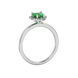 Side view of Emerald Green heart cut gemstone halo ring in white gold