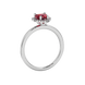 Side view of Raspberry Red heart cut gemstone halo ring in white gold