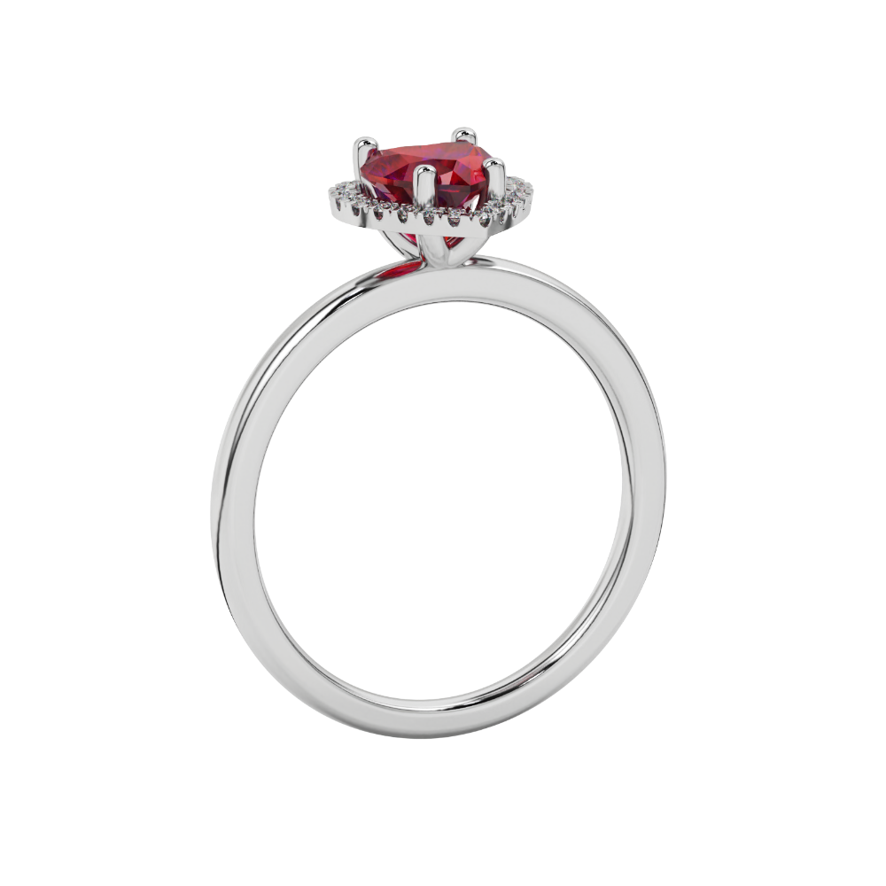 Side view of Raspberry Red heart cut gemstone halo ring in white gold