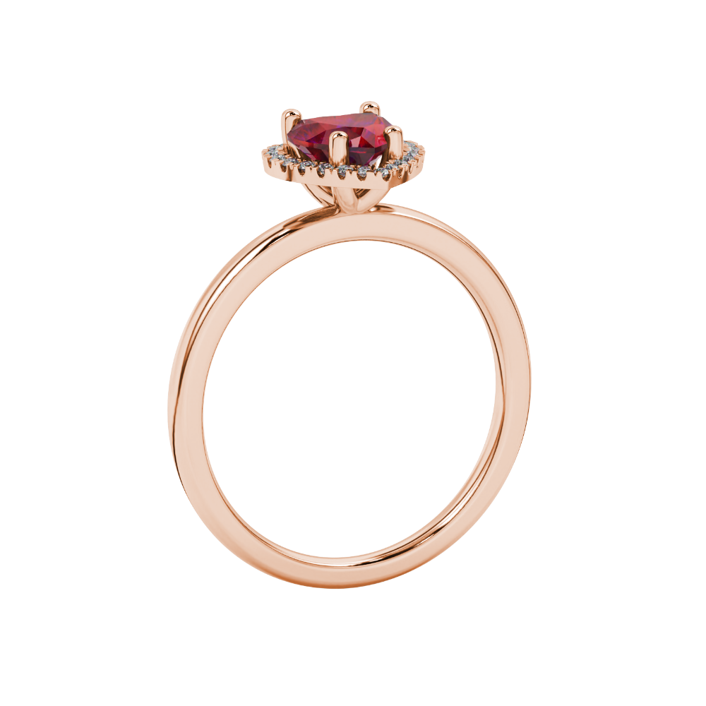 Side view of Raspberry Red heart cut gemstone halo ring in rose gold