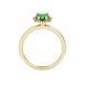 Emerald Green heart cut gemstone halo ring in yellow gold
