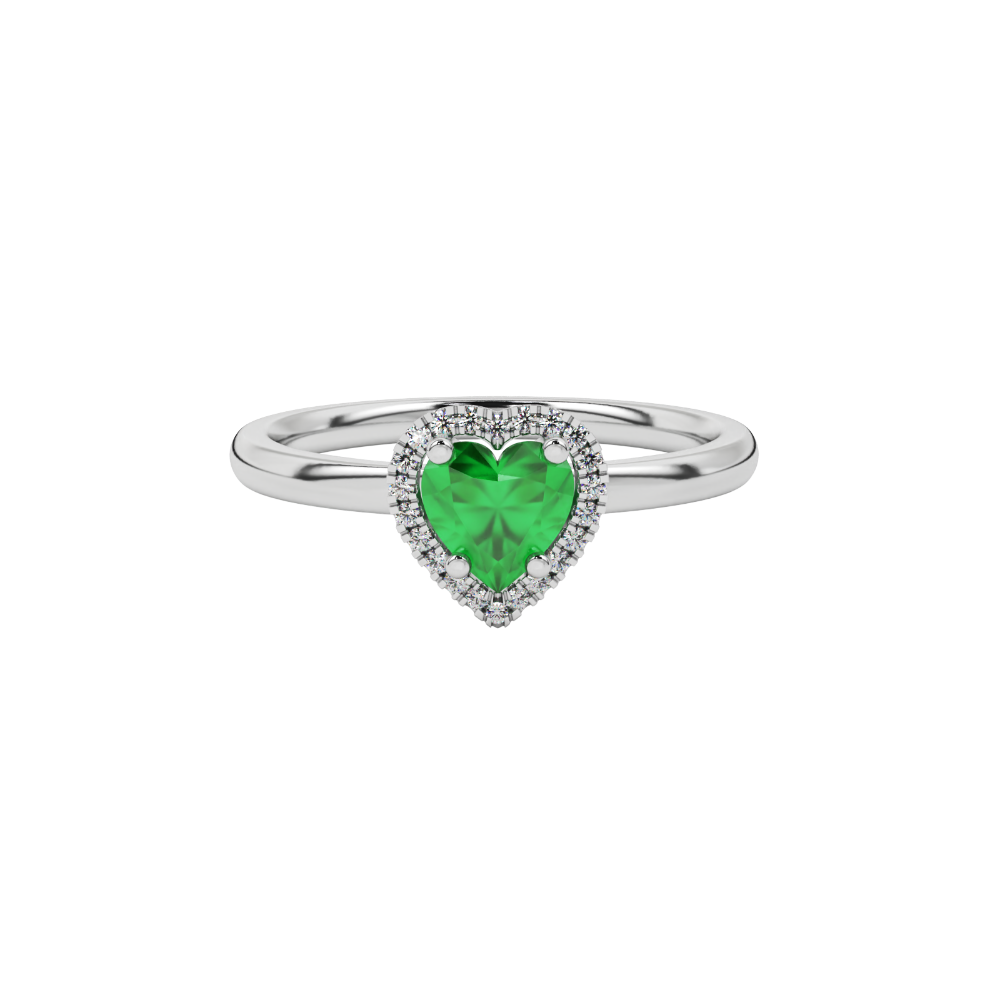 Close-up angled shot of Emerald Green heart cut halo ring in white gold on finger