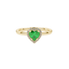 Close-up angled shot of Emerald Green heart cut halo ring in yellow gold on finger