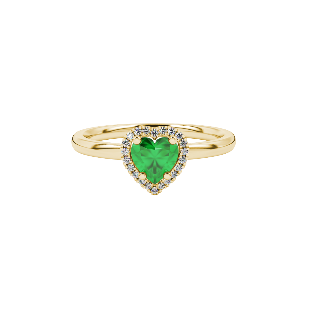 Close-up angled shot of Emerald Green heart cut halo ring in yellow gold on finger