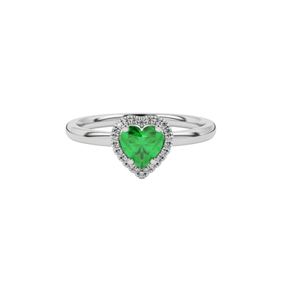 Close-up angled shot of Emerald Green heart cut halo ring in white gold on finger