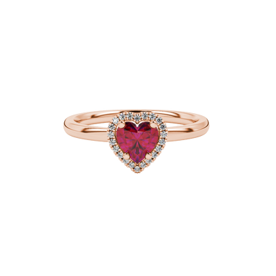 Close-up angled shot of Raspberry Red heart cut halo ring in rose gold on finger