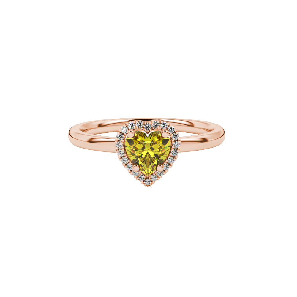 Close-up angled shot of Canary Yellow heart cut halo ring in rose gold on finger