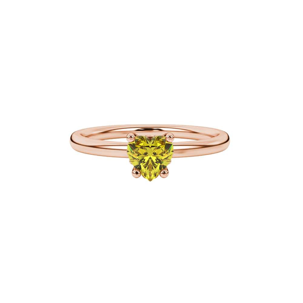 Close-up angled shot of Canary Yellow heart cut lotus basket halo ring in rose gold