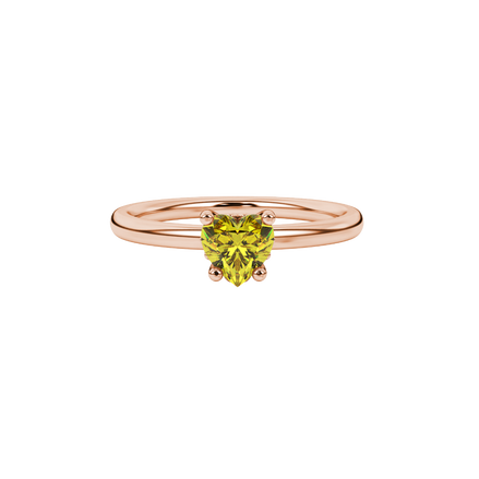 Close-up angled shot of Canary Yellow heart cut lotus basket halo ring in rose gold