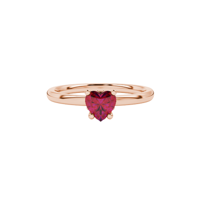 Close-up angled shot of Raspberry Red heart cut lotus basket halo ring in rose gold