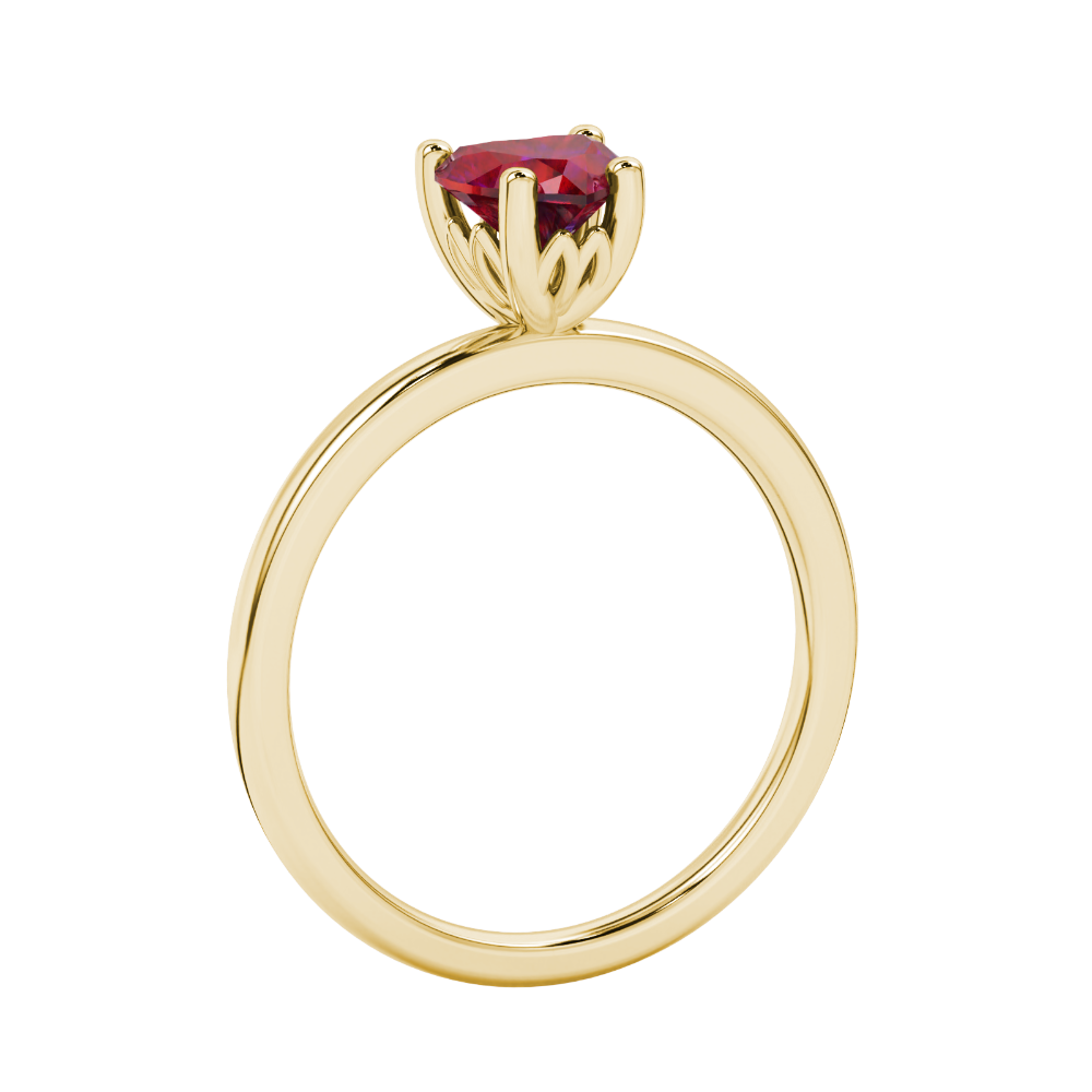 Side view of Raspberry Red heart cut gemstone halo ring showcasing the yellow gold