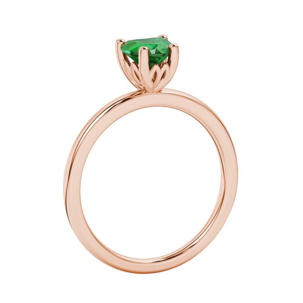 Side view of Emerald Green heart cut gemstone halo ring showcasing the rose gold