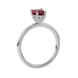 Side profile of a white gold heart gemstone ring showing the detailed diamond pavé basket gallery.